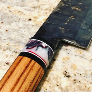 Knife with candy cane style handle